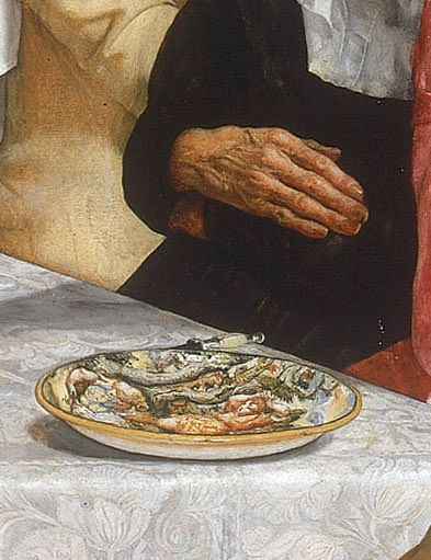 Painting. This detail shows the plate in front of Lorenzo, on the white floral, damask tablecloth. The plate is painted with a scene of a beheading. The end of a knife handle peeks from beyond the plate.
