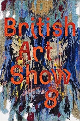 Cover of an exhibition catalogue. Layered fields of fabric, textiles, or bleeding paint create a shaggy design in shades of blue, black, white, brown, and yellow. The title takes up most of the image in red letters. Some of the letters seem to be angled, as when a paper is pulled while making a photocopy.