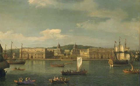 Painting. From the far side of a river, we look at two long, boxy buildings coming towards us on either side of a plaza in this wide landscape.