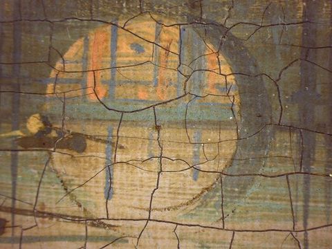 Painting. Compass marks can be seen outlining the rings of a half-arch above the water line and the corresponding reflection below. Cracks in the paint are like a net across the surface.