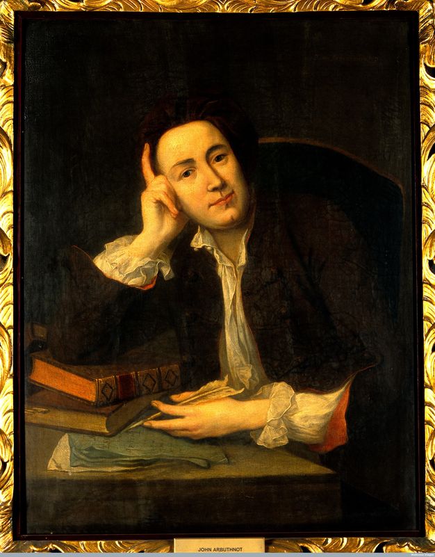 Painting. Shown from the waist up, a pale-skinned, clean shaven man sits at a table with his oval face resting in one hand. That elbow is propped on two books, and he holds a quill in his other hand. He wears a dark jacket over a white shirt, which is unbuttoned at the neck and frilled at each wrist.