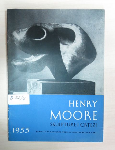 Book cover. The top two thirds is a black and white photograph of a rounded, abstracted bronze sculpture. The bottom zone is blue.