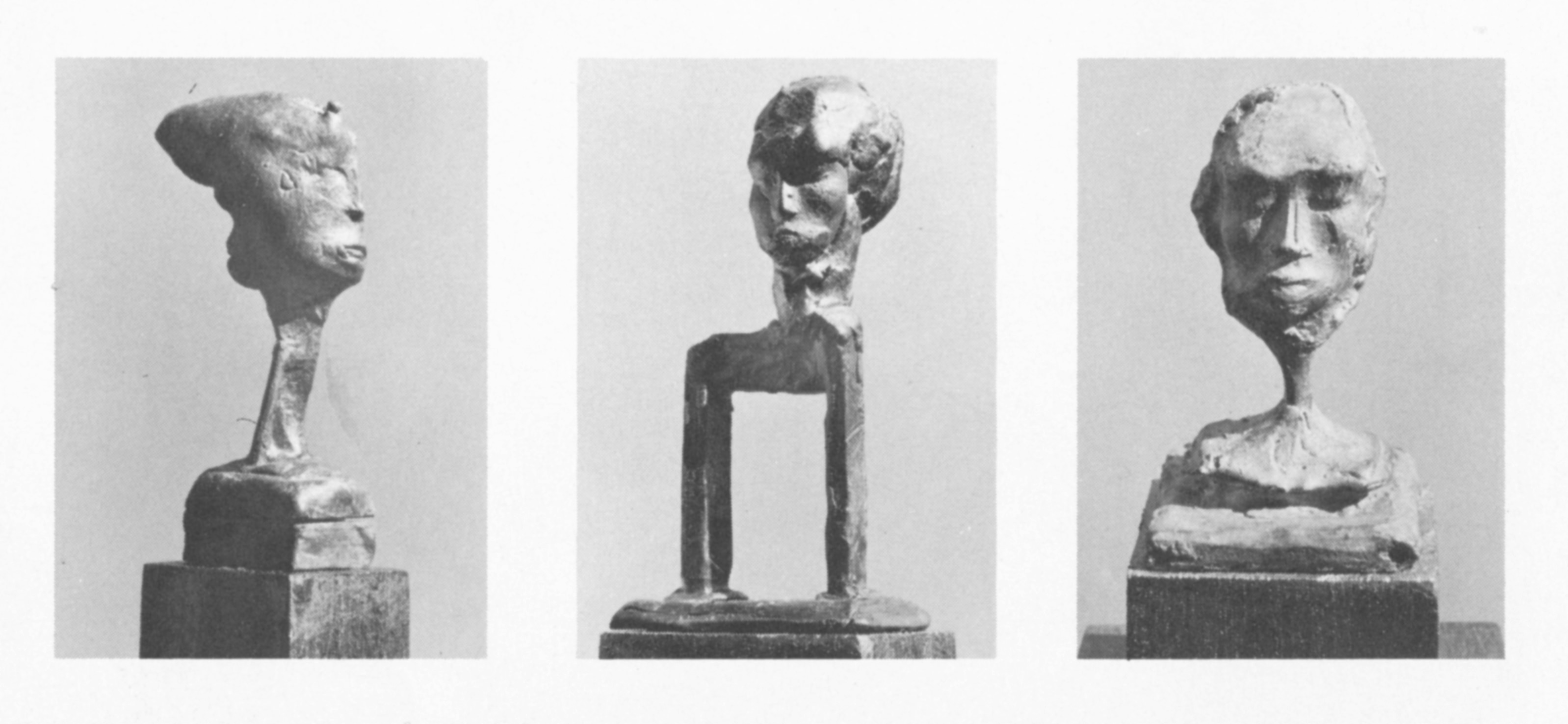 Page of an exhibition catalogue. Three black and white photographs on a white page show different bronze sculptures that distort the human head. The work to our left has a long, ribbon-like neck. The next sits on a shape like a long staple. The third has a head supported on an incongruously spindly neck.