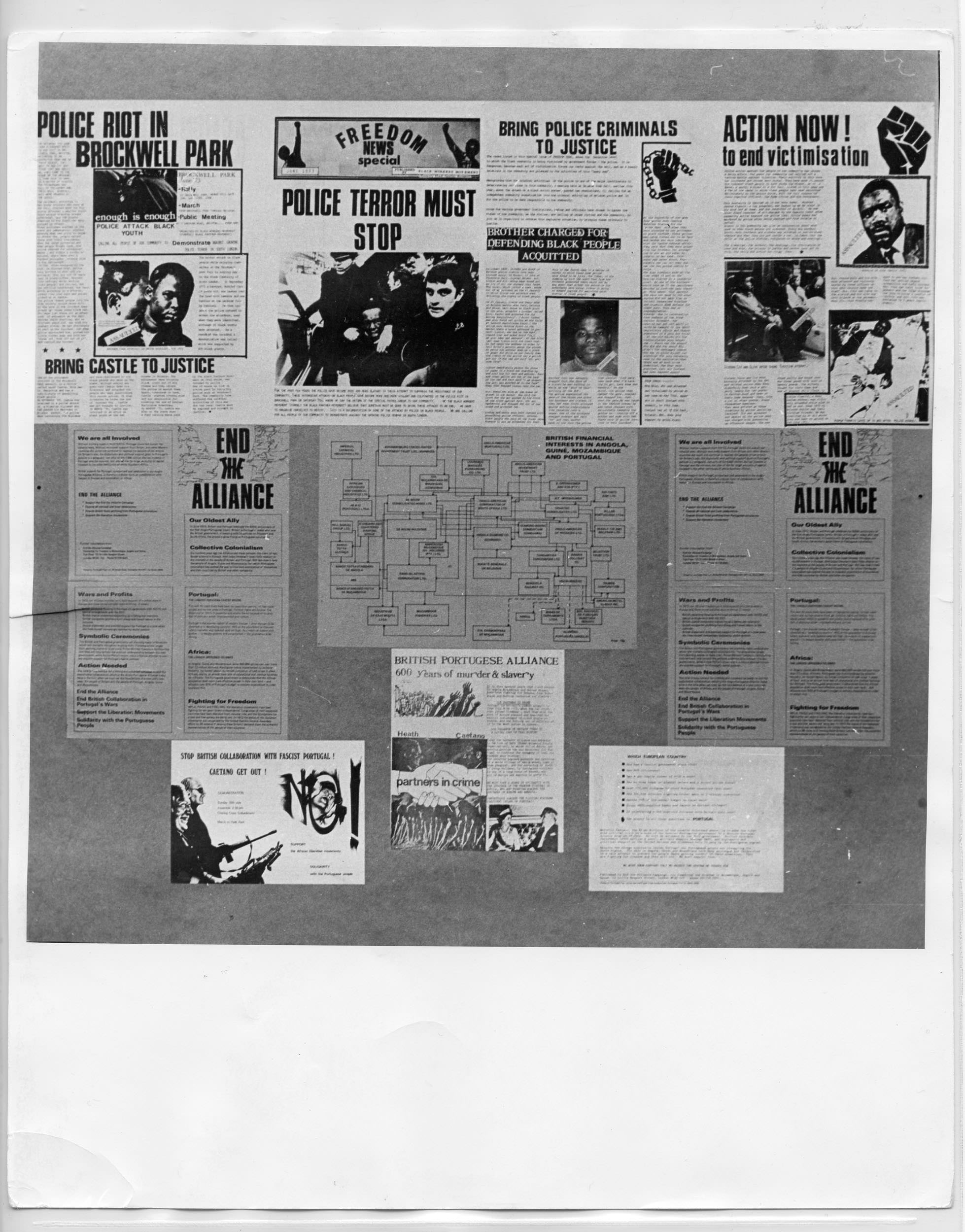 Installation photograph. Black and white photograph of a panel collaged with newspaper clippings, a flow chart, and flyers. Some of the headlines read, “Police Riot in Brockwell Park”, “Police Terror Must Stop,” and “Bring Police Criminals to Justice”.