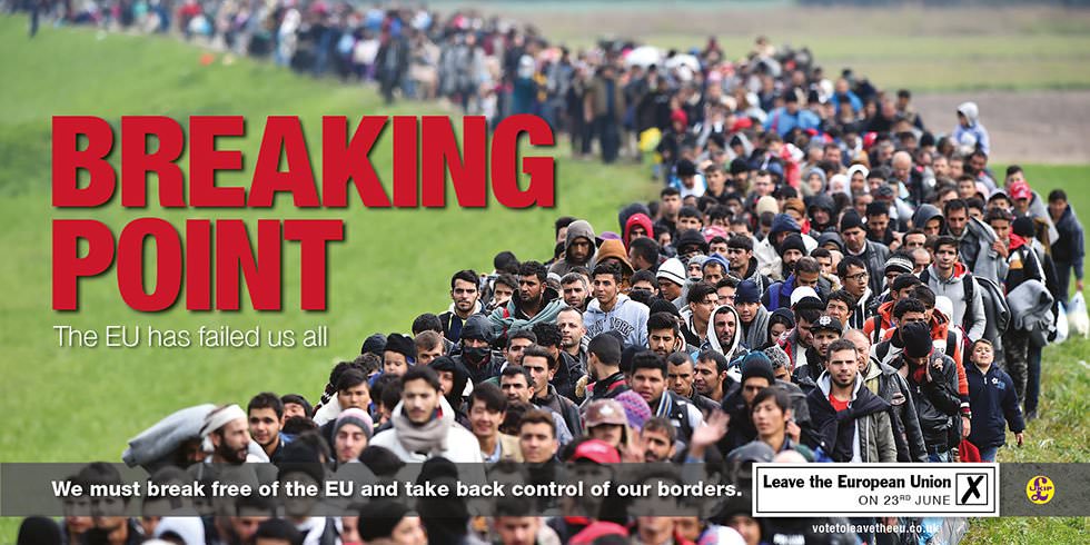Poster. Hundreds of people stand in a thick line seven or eight people wide that curves into the grassy distance. Red text in all caps to the left reads, “Breaking Point”. Below, white text in mixed case reads, “The EU has failed us all”. In a banner across the bottom of the wide poster, text reads, “We must break free of the EU and take back control of our borders. Leave the European Union on 23rd June”.