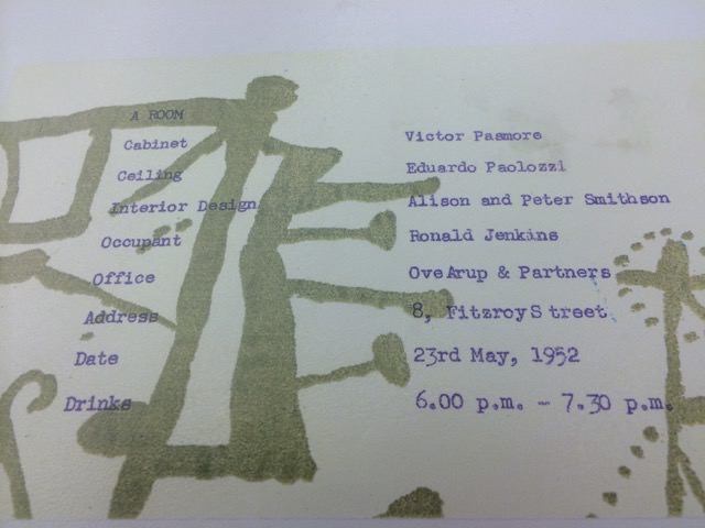 Invitation. An abstract design in translucent olive green is printed on white paper. Purple typewritten text overlays the design in two columns. The first few lines across the columns read, “A Room Cabinet Victor Pasmore Ceiling Eduardo Paolozzi Interior Design Alison and Peter Smithson Occupant Ronald Jenkins”.