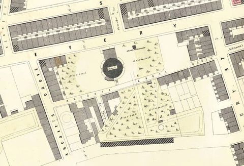 Map. A round chapel is surrounded by spaces marked as “Burial Ground”. Buildings fill the remaining spaces between the streets.