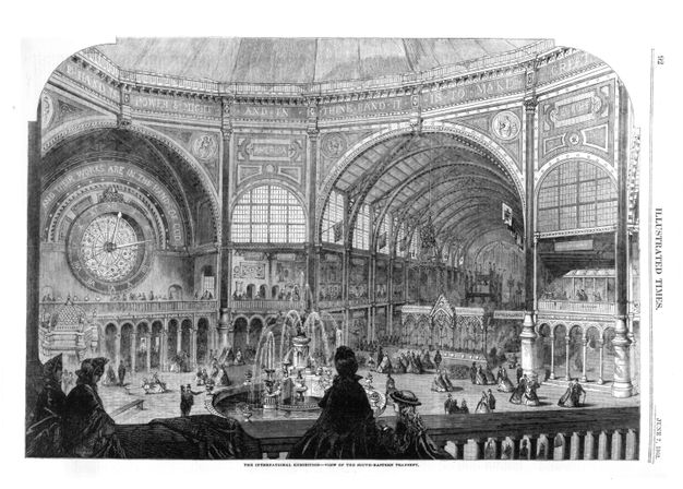 Illustration. A choir screen is set up in a vast and populated exhibition space at the entrance to one tunnel-like arm departing a central hall. Text under the image reads, “The International Exhibition – View of the South-Eastern Transept”.
