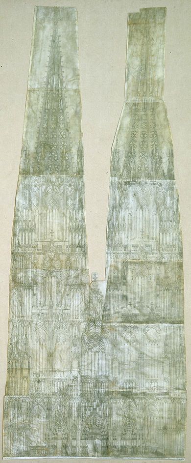 Drawing. Pieces of paper are combined to reconstruct an architectural drawing of the façade and towers of a church. The towers are so tall that at first glance the drawing looks like a pair of upside-down trousers.