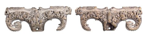 Sculpture. Two views of a T-shaped ivory terminal for a staff. Every surface is carved into leafy designs or creatures. At the intersection of the T is an image of Christ trampling the lion and dragon on one side and the crucifix on the other.