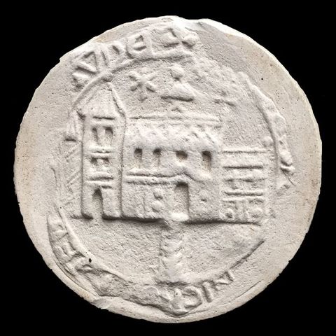 Seal. Cast of a round seal shows a church with a chancel and tower. A path leads to the arched doorway of the church. Traces of text remain around the edges.
