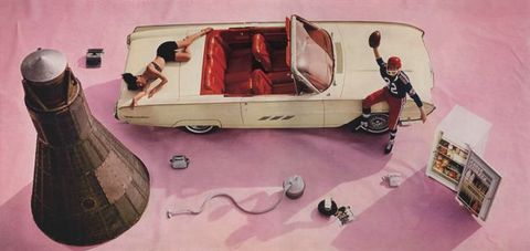 Colour photograph. We look down onto a cream-white convertible with a red interior, a space capsule, an open refrigerator, a telephone, a toaster, and a vacuum cleaner arranged on a mauve-pink cloth. An American football player sits on the hood of the car, holding up a ball, and a woman sprawls on the trunk.