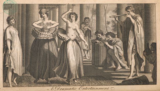 Print. Two women dance as two men play drums and a third man plays a pipe. Both women wear voluminous ruffs around their waists over long, full skirts and bare feet. One woman wears a turban and a gauzy material over her breasts. The other is bare-headed and bare-chested.