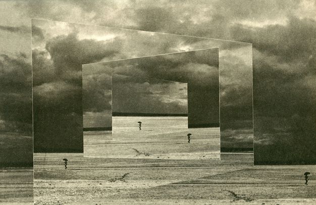 Photogravure. The image of a person with a parasol walking along a beach far from us, below thick, turbulent clouds, is duplicated and laid on the original version several times at a smaller and smaller scale, so the image appears to recede towards the centre of the composition like a hall of mirrors. The orientation of each version is flipped horizontally, so the figure seems to zigzag towards a central point.