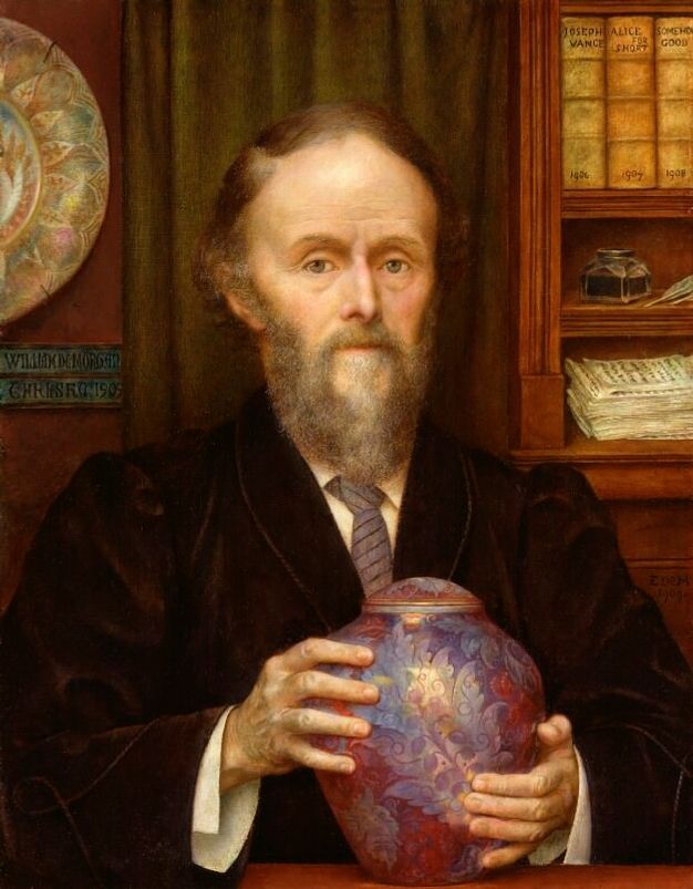 Painting. Shown from the waist up behind a ledge, a pale-skinned man wearing a velvet jacket over a shirt and tie holds an iridescent purple, covered jar in both hands.