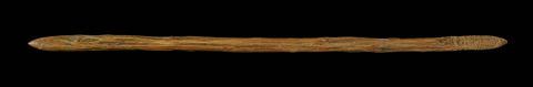 Thin wood club with pointed ends.