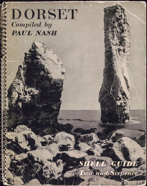 Book cover. Black and white view of a rocky beach has two tall rocks sticking out of calm water like broken bones. The title appears at the top left of this spiral-bound book. In the lower right, text reads “Shell Guide Two and Sixpence”.