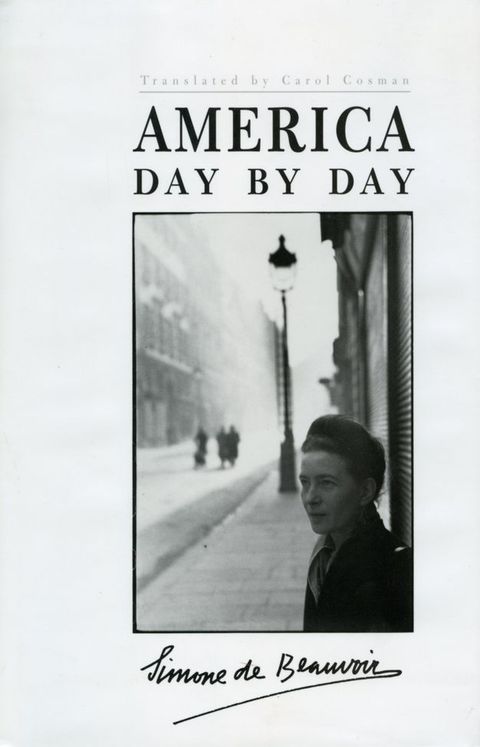 Book cover. A black and white photograph shows a woman from the shoulders up standing against a building along a city street. Text above reads, “Translated by Carol Cosman”.