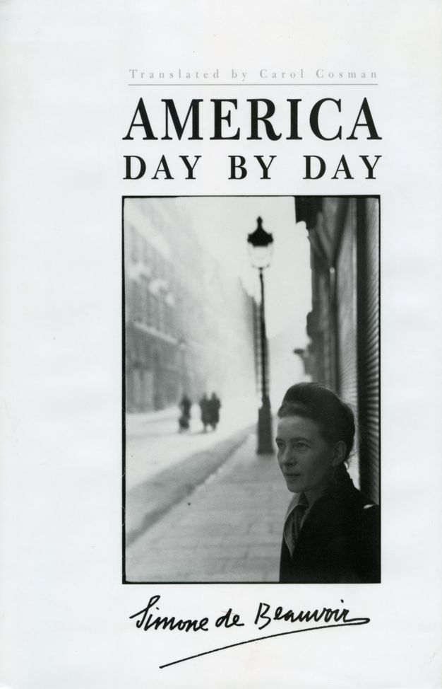 Book cover. A black and white photograph shows a woman from the shoulders up standing against a building along a city street. Text above reads, “Translated by Carol Cosman”.