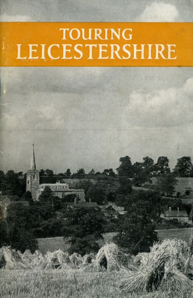 Book cover. A black and white photograph of sheaves of hay and a town nestled among trees. A title in white appears in an orange band across the top.