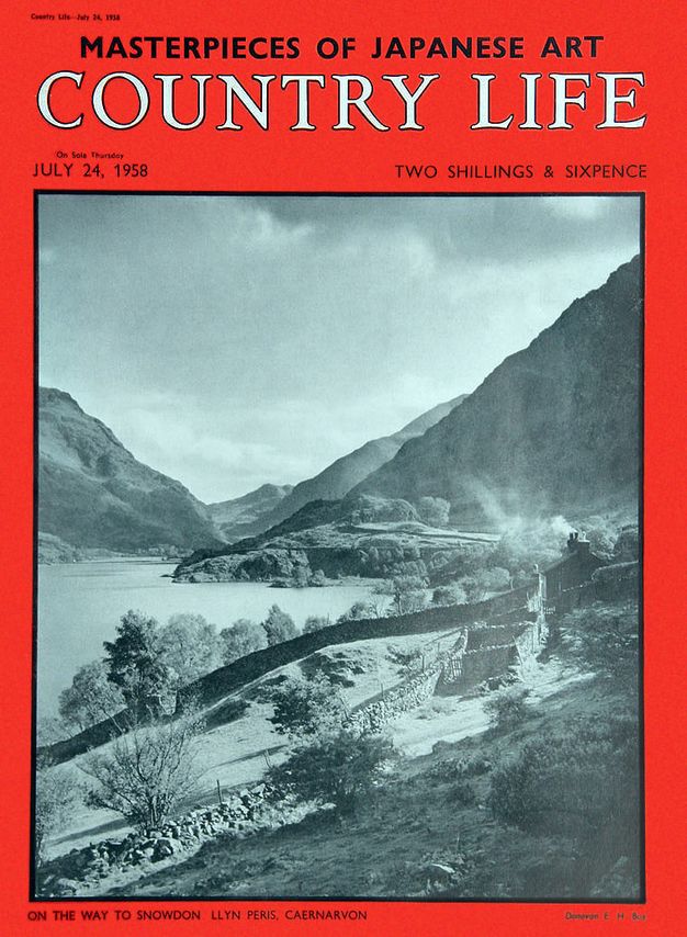 Magazine cover. A black and white photograph shows mountains leading to a body of water. Against the bright red background of the journal cover, black and white text reads, “Masterpieces of Japanese Art Country Life”. The date is “July 24, 1958” and price is “Two Shillings & Sixpence”.