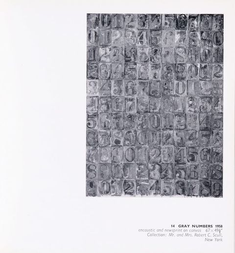 Page from a book. Black and white illustration of a grid of eleven rows by eleven columns. Each space is filled with a single number. The texture or colouring of the numbers and background in each space makes some hard to distinguish in this reproduction. A caption below reads, “14 Gray Numbers 1958 encaustic and newsprint on canvas 67 x 49 ½" Collection: Mr. and Mrs. Robert C. Scull, New York”.