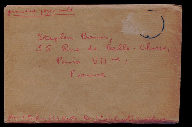 Envelope. Red pen on a yellowed envelope is addressed, “Stephen Bann 55 Rue de Bellechasse Paris VIIme, France”.