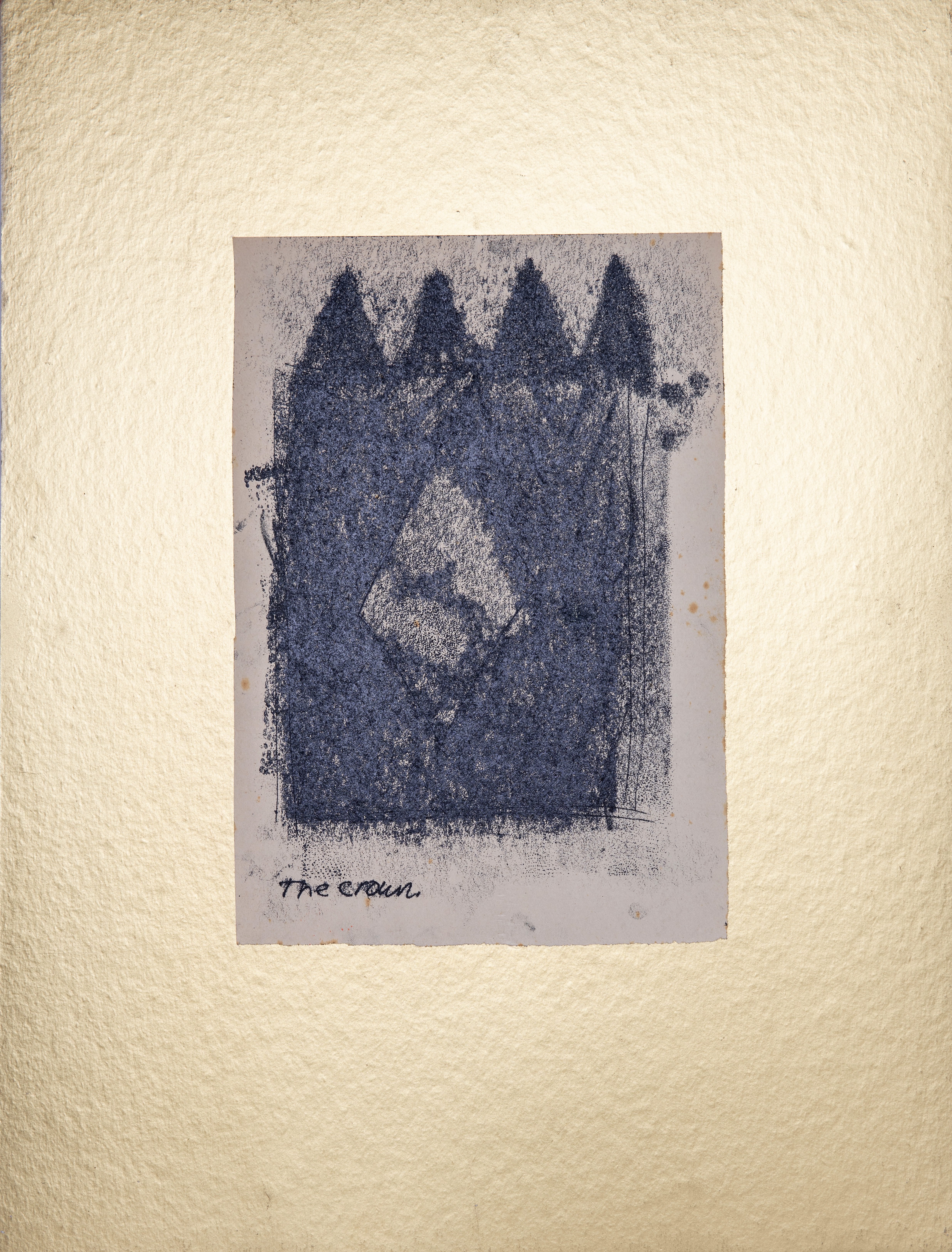 Print. A blocky, dark grey form is topped with four peaks like a crown. The edges are blurred and seem textured. The title is written below a smudged area surrounding the image on the monoprint.