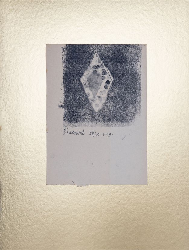 Print. A diamond shape is left the grey of the paper within a larger square of black ink, which appears to have been dabbed on. A faint grey diamond is at the centre of the blank space, and dots like fingerprints fill in the white perimeter. The title is written below.