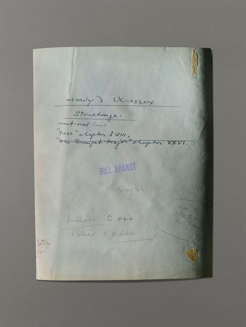 The back of a photograph has handwritten notes in pen and pencil. A stamp reads “Bill Brandt”.