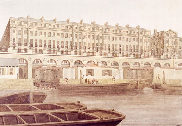 Watercolour/drawing[??]. Across a river, four levels with thirty-three windows each line long, rectangular building. A row of arches below and in front of the building is partially hidden by a structure on the dock.