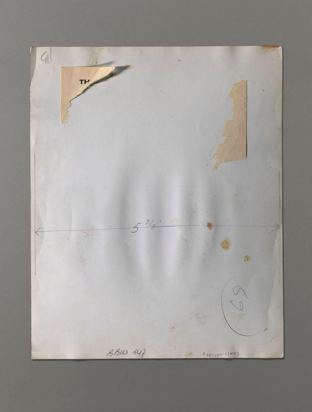 The back of a photograph has a dimension marked across its width, “5 3/8””. A label is mostly torn off above.