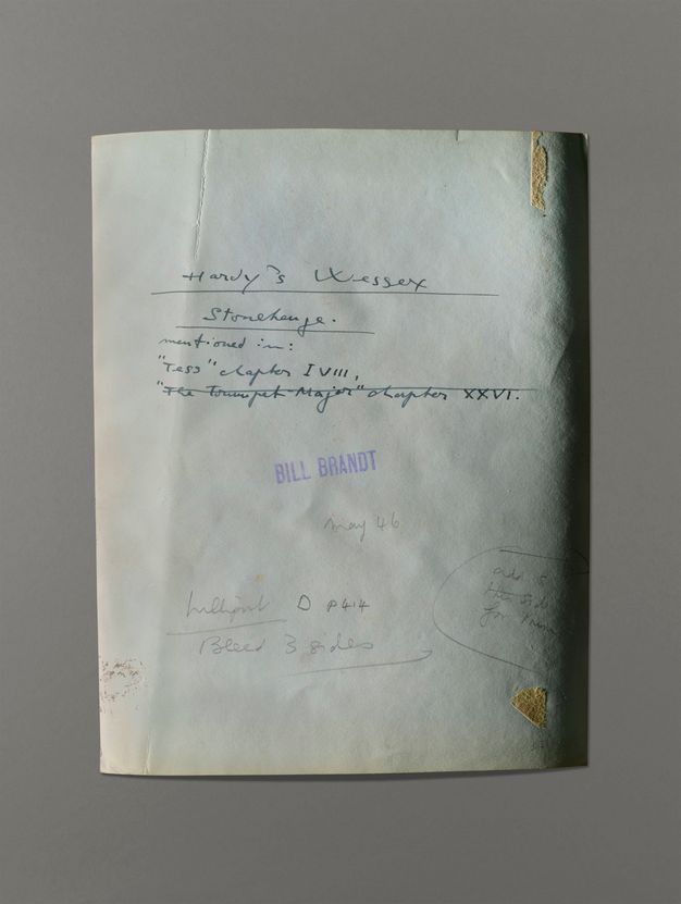 The back of a photograph has handwritten notes in pen and pencil. A stamp reads “Bill Brandt”.