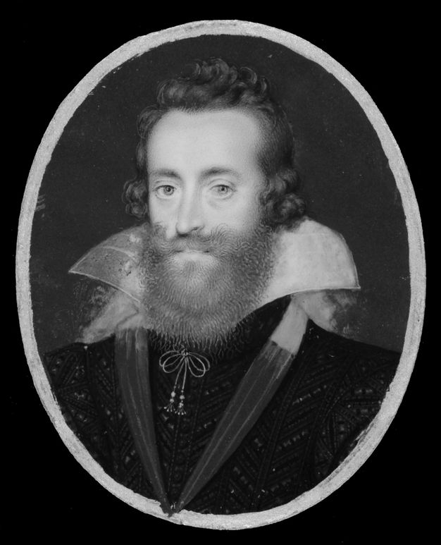 Infrared photograph. Black and white image of a man shown from the chest up in an oval frame. He wears a dark jerkin, and the infrared shows that the white collar used to lay flat, but now flares up.
