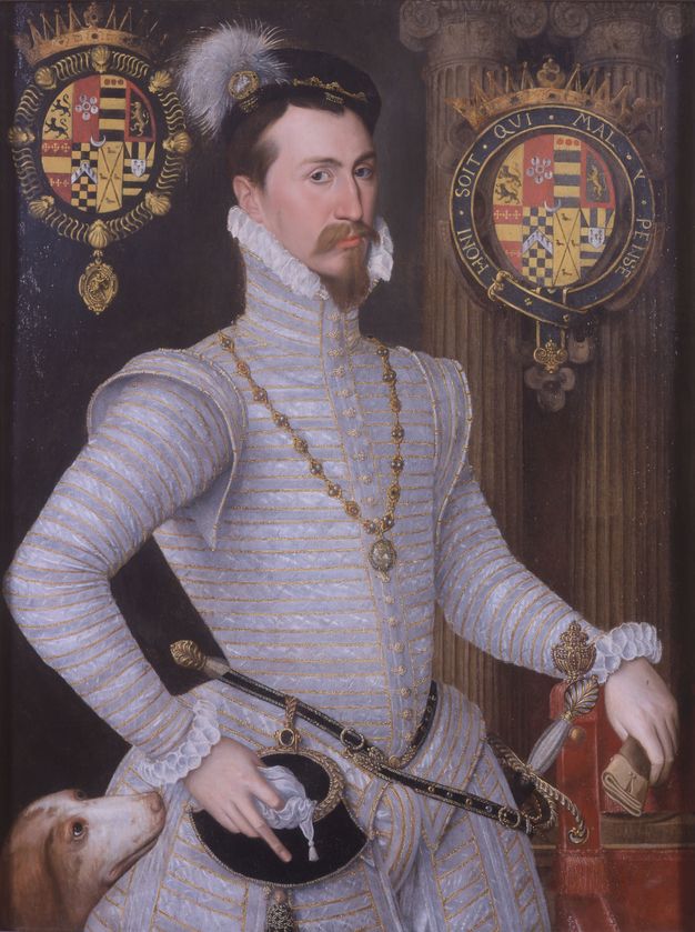 Painting. Shown from the hips up, a pale-skinned man wearing a silvery, lavender purple suit looks out at us. He has close-set eyes, a bumped nose, and a goatee on a narrow chin. A dog peeks into the portrait from the bottom left corner, and coats of arms are in the upper corners.