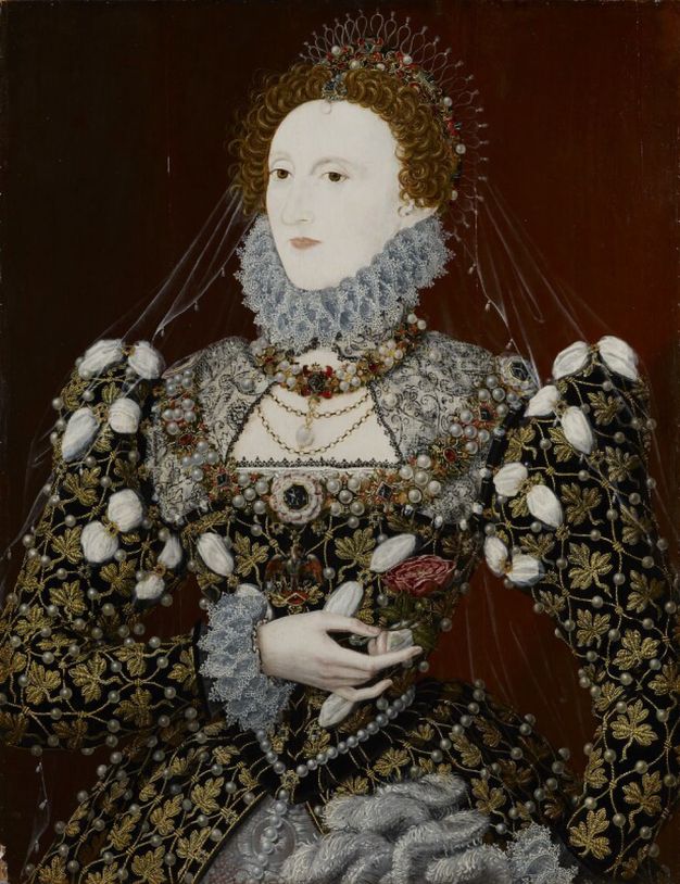 Painting. Shown from the hips up, a smooth-skinned woman with a nearly ash-white face and red curly hair is shown against a port-wine-red background. She is angled to our left and looks in that direction with brown eyes. Her crown, jewellery, and dress are encrusted with gold, gems, and pearls.