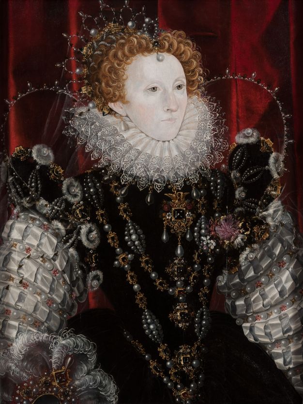 Painting. A smooth-skinned woman with a powder-white face touched with pink at the cheeks and nose is shown from the hips up in front of a ruby-red curtain. She is angled to our right and looks in that direction with hazel eyes. The crown in her copper-red curls, her jewellery, and dress glisten with gold, gems, and pearls.