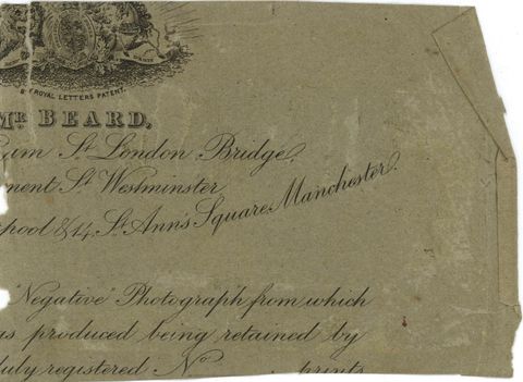 Ad. Detail view of cursive copperplate writing includes snippets of text, including “Mr. Beard”, “London Bridge”, “Westminster”, “& 14 St Ann’s Square Manchester”, “‘Negative’ Photograph from which...produced being retained by...”