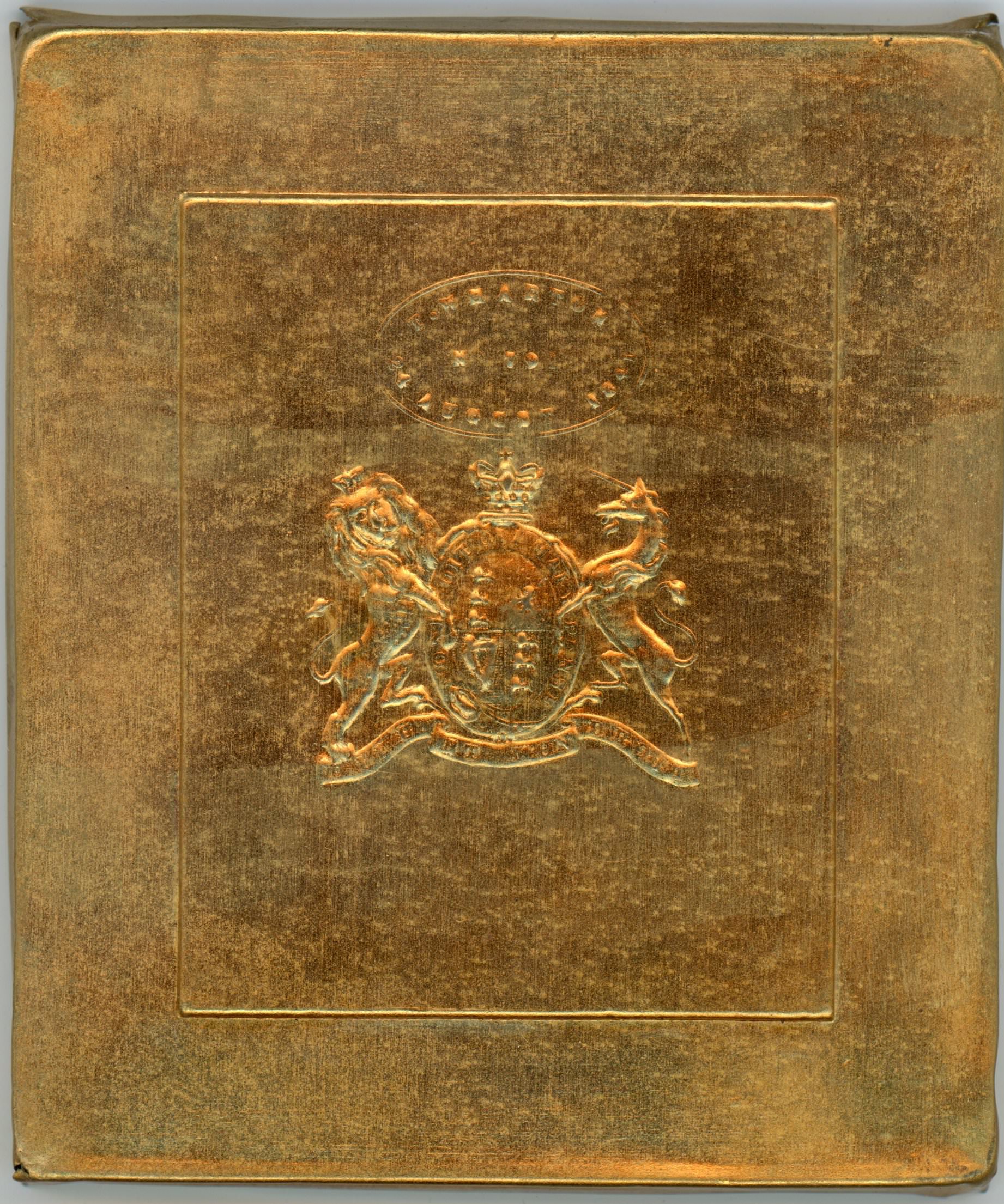 Metal plate. Brass sheet cast with a coat of arms beneath an insignia.