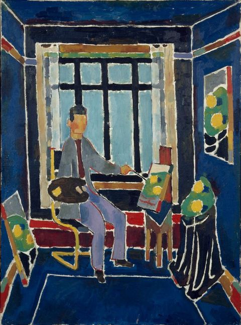 Painting. A person sits painting at an easel at the far end of a room. The floor, wall, and ceiling are cobalt blue. The man has dark peach-coloured skin and black hair. Rails and grilles of the window opposite us seem to box the man in.