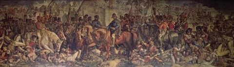 Painting. Two men on horseback shake hands at the centre of this panoramic scene. Scores of men in military uniform surround the pair and are on horseback, foot, or attending to the dead and wounded. 