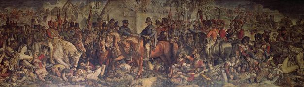 Painting. Two men on horseback shake hands at the centre of this panoramic scene. Scores of men in military uniform surround the pair and are on horseback, foot, or attending to the dead and wounded. 