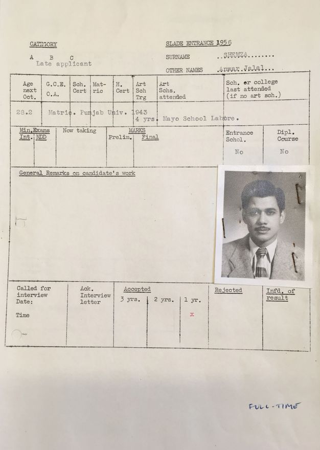 Typewritten form. A passport-sized, black and white photograph of a man is stapled to a school form. He has medium dark skin, thick, black hair, and a thin moustache.