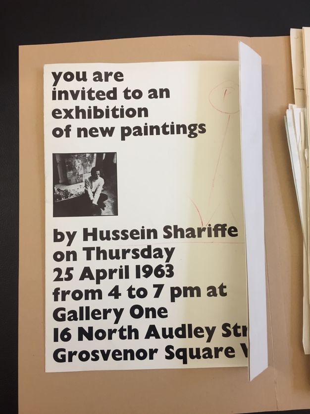 Brochure. Black text is above and below a square, black and white picture of a person in what might be a studio. Above the image, all lowercase text reads, “you are invited to an exhibition of new paintings” with the date and location provided below. 