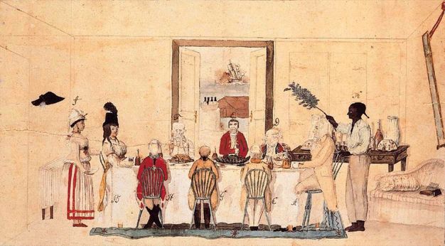 Watercolour. Eight pale-skinned men and women sit around a long table, dining. A medium-skinned woman stands behind the woman sitting at the foot of the table, and a man with very dark brown or black-coloured skin fans a leaf or branch over the man sitting at the head of the table.