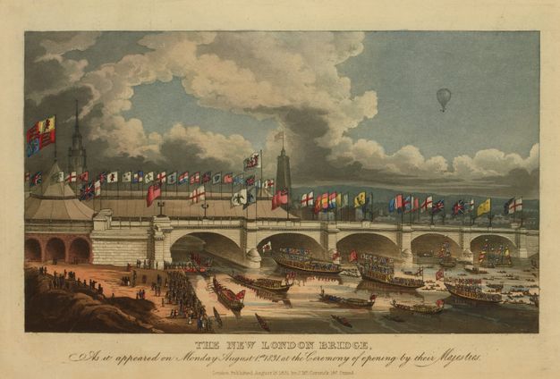 Engraving. Flags line an arched bridge, under which long boats pass. A balloon is in charcoal-grey silhouette in the distance near the upper right corner of this coloured engraving.