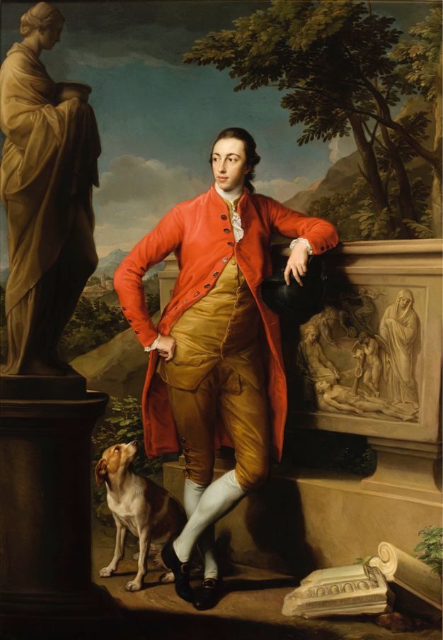 Painting. A pale-skinned, clean-shaven man with dark hair leans one elbow on the edge of a stone sarcophagus and looks off to our left, ankles crossed. The other hand, planted on his hip, holds back one side of his scarlet-red, knee-length coat.