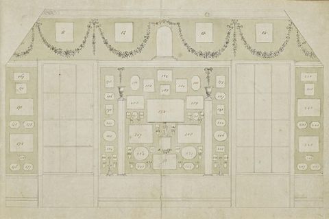 Drawing. Diagram captures the shapes and locations of prints affixed to the wall of a room with two windows. Each space is numbered.