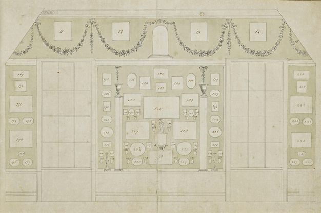 Drawing. Diagram captures the shapes and locations of prints affixed to the wall of a room with two windows. Each space is numbered.