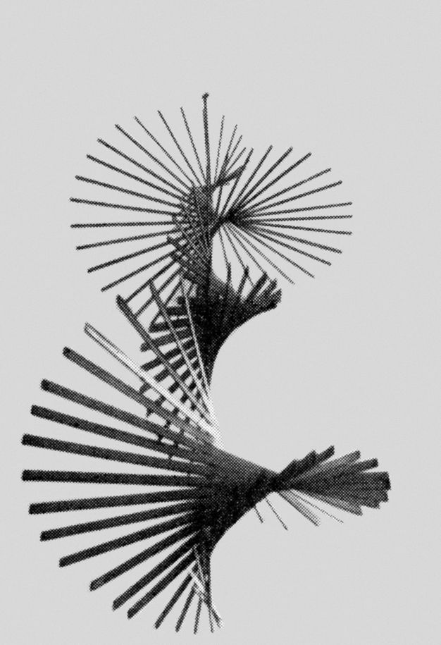 Metal sculpture. Black and white photograph looking up the length of a spiral-shaped mobile sculpture spinning around a long vertical metal rod. The mobile consists of long flat metal plates that are shorter at the top and bottom and longer in the middle, arranged so that the spiral formation seems to expand and contract.